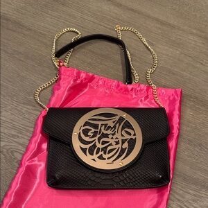 Dareen Hakim "Le Icon" black crocodile embossed patent leather clutch